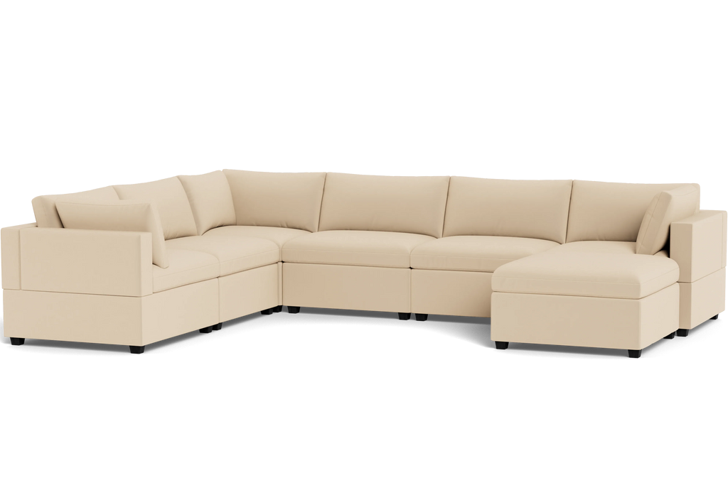 Kova Box Cushion Grand Corner + Ottoman - front view in living room