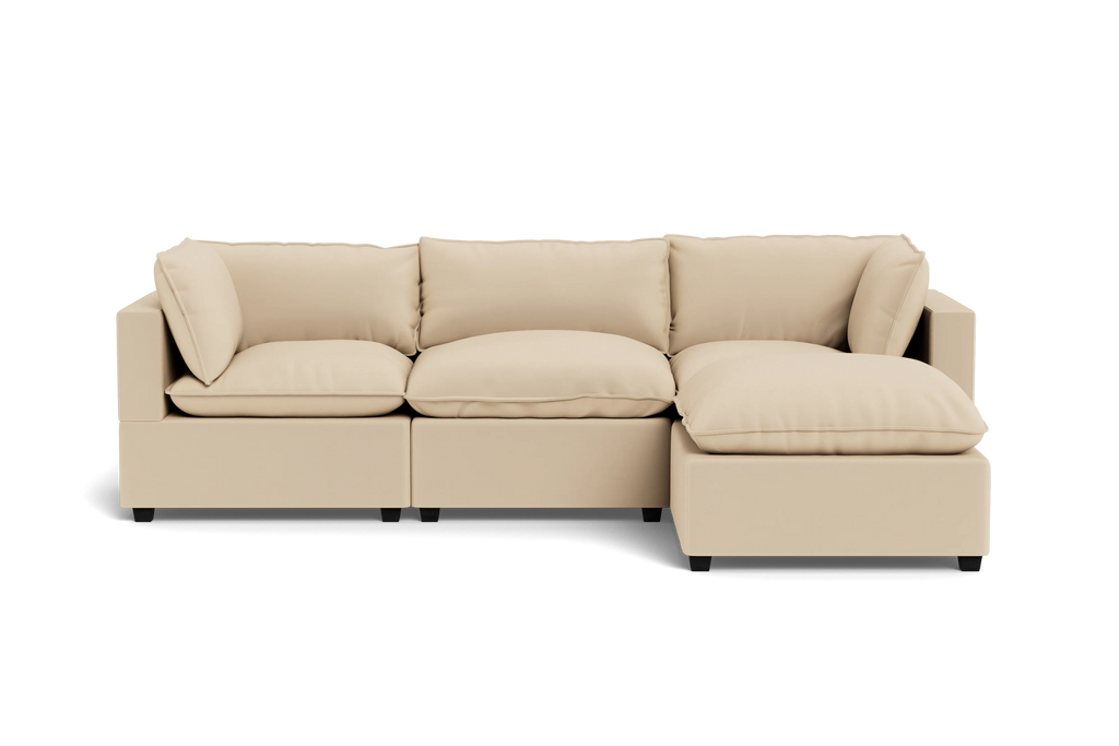 Kova Pillow Cushion Sofa 122" + Ottoman - front view in living room